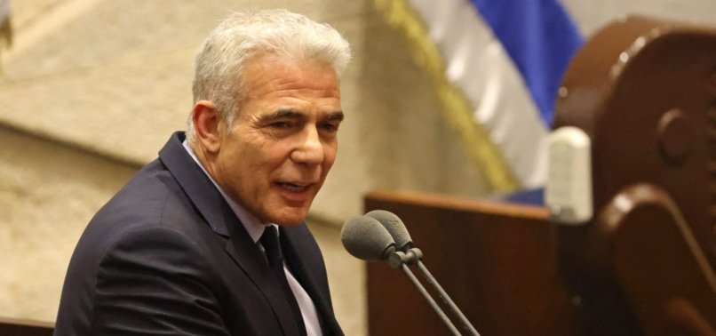 ISRAEL PARLIAMENT HOLDS VOTE TO DISSOLVE, LAPID SET TO BE PM