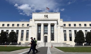 Fed keeps rates flat, says tapering to start later this month