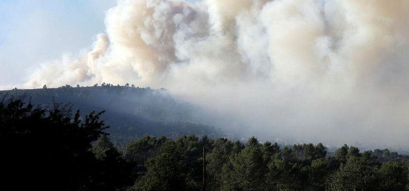 THOUSANDS EVACUATED AS WILDFIRES RAGE IN FRANCE