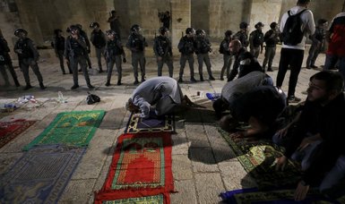 Thousands of Palestinian Muslims flock to Masjid al-Aqsa to perform morning prayer
