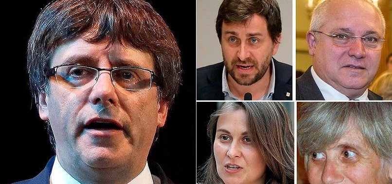 CATALAN POLITICIANS TURN THEMSELVES INTO BELGIAN POLICE