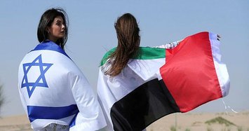 Israeli waves flag in UAE pajama photoshoot