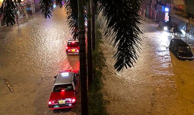 Record rainfall causes flooding in Hong Kong days after typhoon