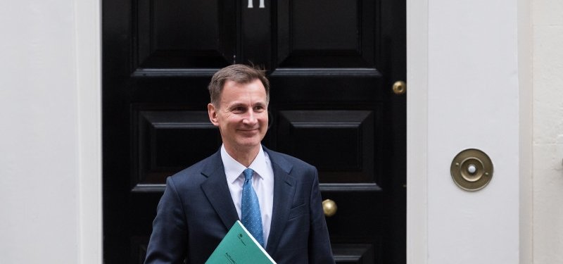 UK's Hunt cuts budget deficit forecasts
