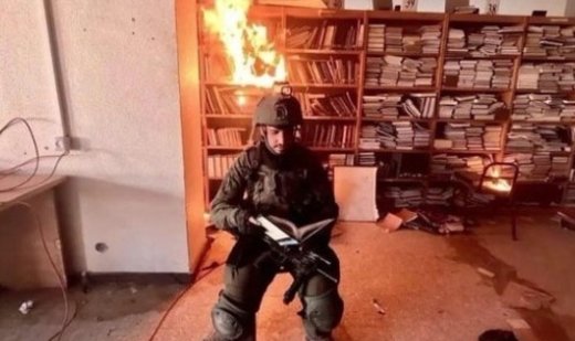 Israeli soldiers burn Al-Aqsa University library in Gaza Strip