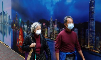 Hong Kong reports 8,841 new daily coronavirus infections