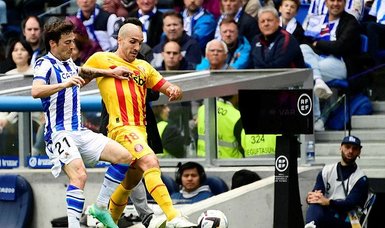 Spanish midfielder Romeu returns to Barcelona on three-year deal