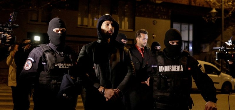 Divisive social media star Andrew Tate detained in Romania