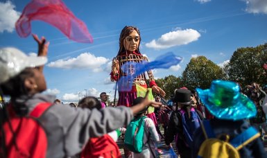 Little Amal, symbol of child refugees, reaches Paris