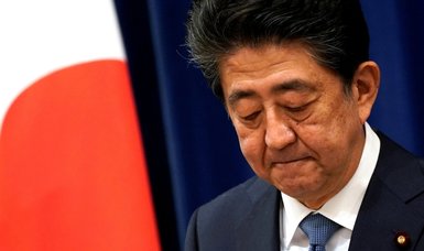 Ex-Japan premier Abe questioned over dinner party bills