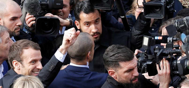 MACRON AIDE WHO STRUCK PROTESTER TO BE FIRED