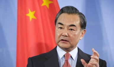 China FM says Minsk Agreement 'only way out' on Ukraine, invites U.N. human rights chief