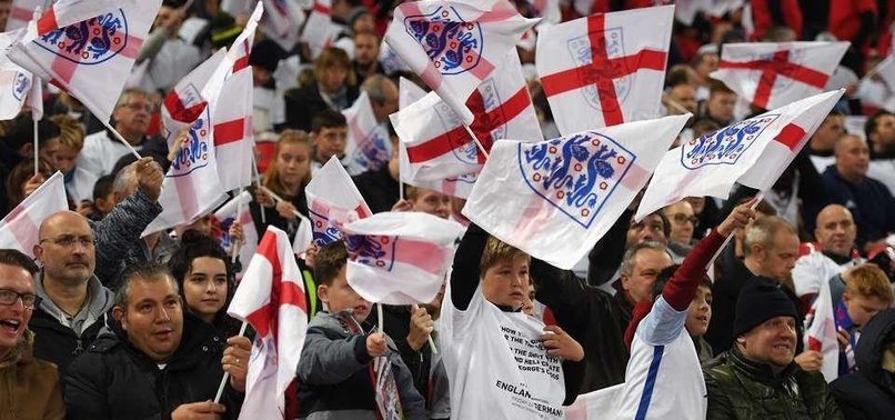 ENGLAND FANS WARNED OVER FLAG-WAVING AT WORLD CUP