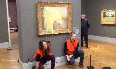 Climate activists hurl mashed potatoes at Monet painting in Germany