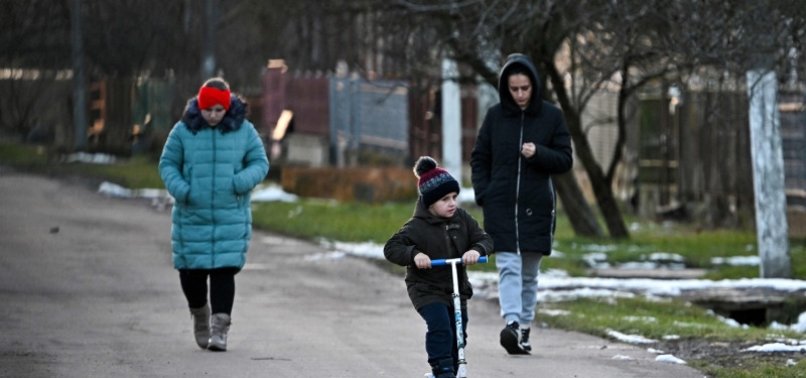 UKRAINIAN FAMILY HOPES FOR FATHERS RETURN FROM RUSSIAN CAPTIVITY