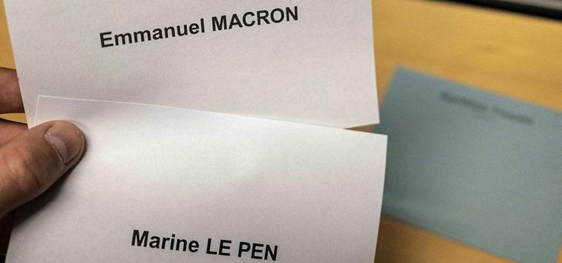 FRENCH MEDIA OUTLETS CALL ON VOTERS TO CAST BALLOTS IN FAVOR OF MACRON TO PREVENT LE PEN FROM COMING TO POWER