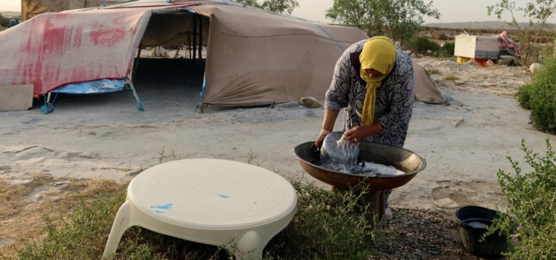 IN DROUGHT-STRICKEN TUNISIA, PEOPLE TRAVEL LONG DISTANCES TO COLLECT WATER
