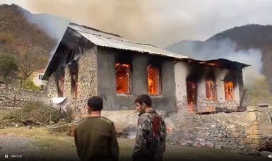 Armenians set fire to houses before leaving city of Kalbajar in line with Karabakh agreement