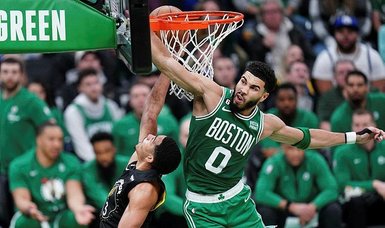 Celtics outlast Warriors in OT for eighth straight win