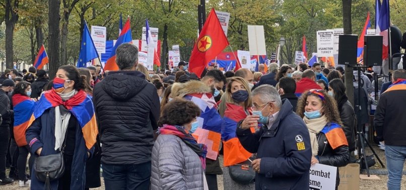PKK SUPPORTERS TAKE PART IN PARIS PROTEST STAGED BY ARMENIANS