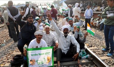 Protesting India farmers halt train operations