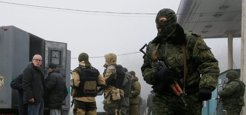 RUSSIA SAYS 63 SERVICEMEN RETURN HOME IN NEW ROUND OF WAR PRISONERS EXCHANGE WITH UKRAINE