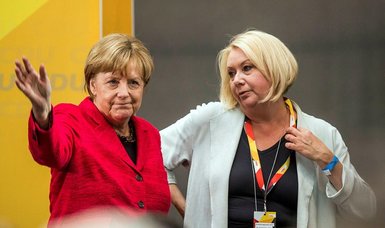 German lawmaker dies after collapsing on flight home