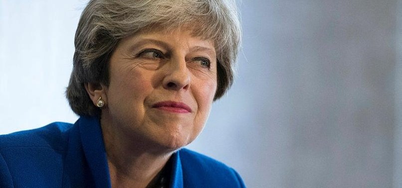 BRITISH PM MAY SAYS UBERS LONDON BAN DISPROPORTIONATE