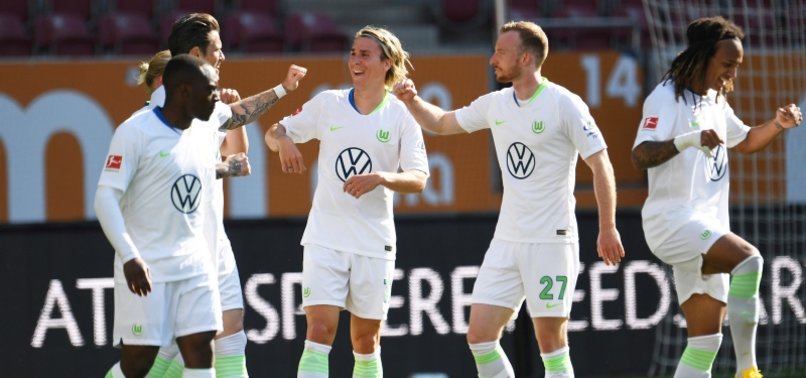 WOLFSBURG BEAT AUGSBURG 2-1 WITH GINCZEKS LATE WINNER