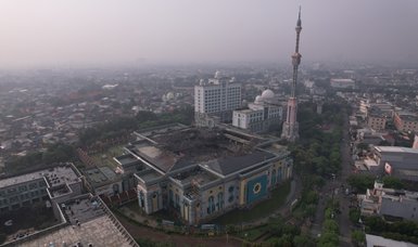 Jakarta grand mosque's dome collapses after fire