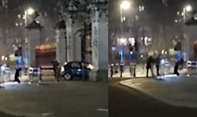 Man arrested after car strikes gates of Buckingham Palace