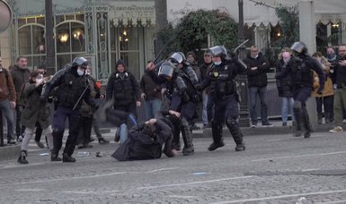 Almost 100 detained in connection with banned convoy protest in Paris