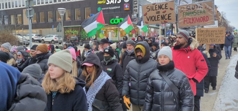 DOZENS GATHER OUTSIDE U.S. EMBASSY IN STOCKHOLM TO PROTEST ISRAELS ATTACKS ON GAZA
