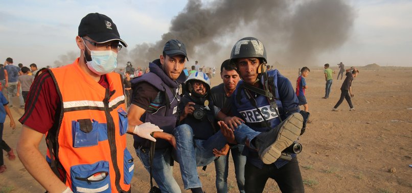 GAZA JOURNALISTS TARGET OF ISRAELI SNIPERS