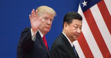 Trump says he held off Xinjiang sanctions due to trade talks