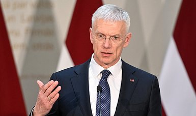 Latvia's foreign minister resigns over charter flight scandal