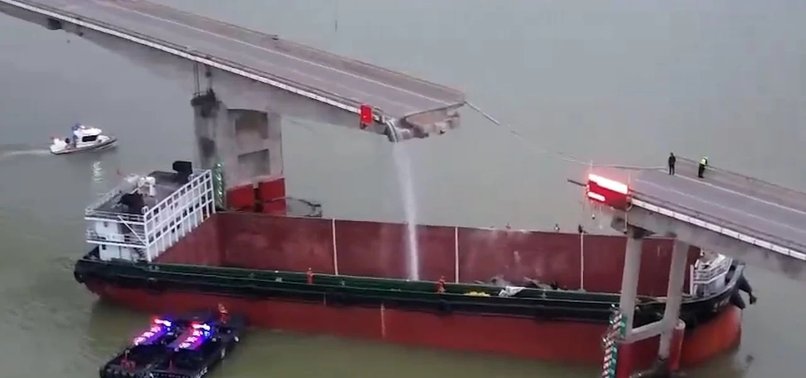 2 KILLED WHEN CARGO SHIP RAMS BRIDGE IN CHINA, SENDING VEHICLES INTO WATER