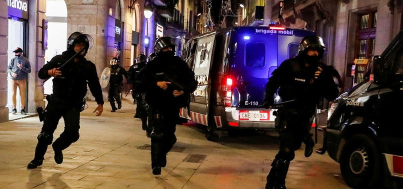 PROTESTERS CLASH WITH POLICE OVER COVID-19 RESTRICTIONS IN BARCELONA