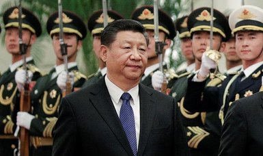 China accused of paying bribes to secure international deals