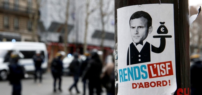 MACRON SAYS JUNCTION OF SOCIAL NETWORKS, TV STREAMING A POISON FOR DEMOCRACY