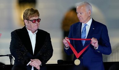 Elton John gives White House performance, receives medal