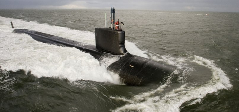 COUPLE IN SUBMARINE SPY CASE TO REMAIN HELD; HEARING SET