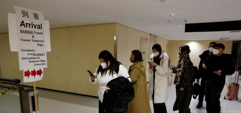 JAPAN TO END MANDATORY VIRUS TESTS FOR TRAVELERS FROM CHINA