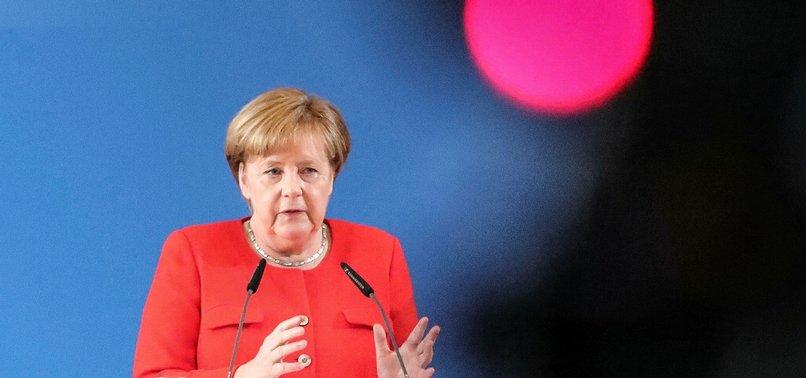 MERKEL ENCOURAGES WOMEN IN HER PARTY TO PLAY LARGER ROLE