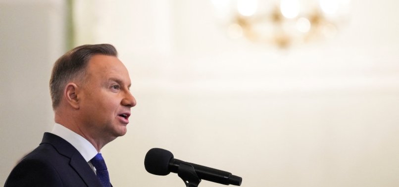 POLISH PRESIDENT SAYS HE WILL WORK TO FREE IMPRISONED FORMER MINISTERS