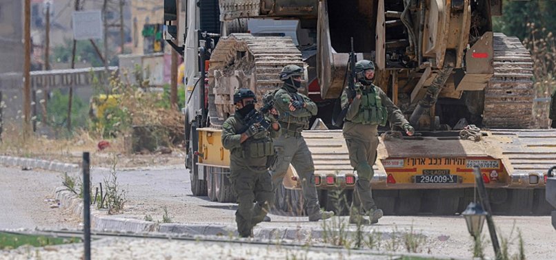 ISRAELI ARMY BLOWS UP PALESTINIAN VEHICLES IN WEST BANK