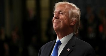 Trump attacks Mueller, denies that Russia helped him win