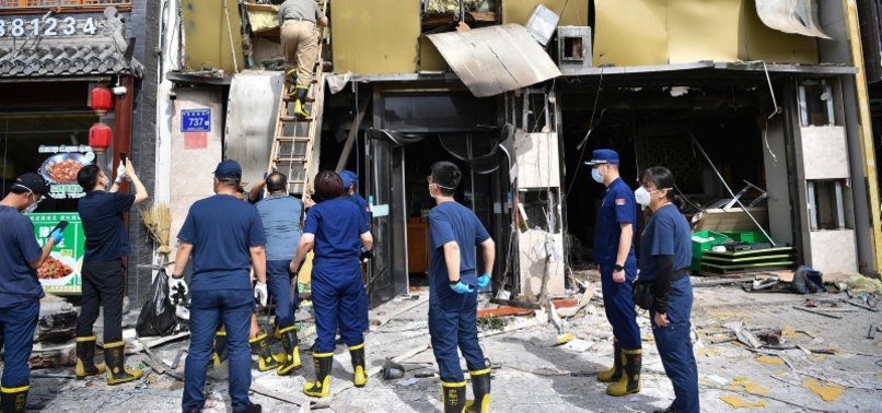 FOUR ARRESTED OVER CHINA RESTAURANT BLAST THAT KILLED 31