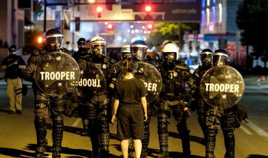 Ohio city Akron imposes curfew after protests over police killing of black man