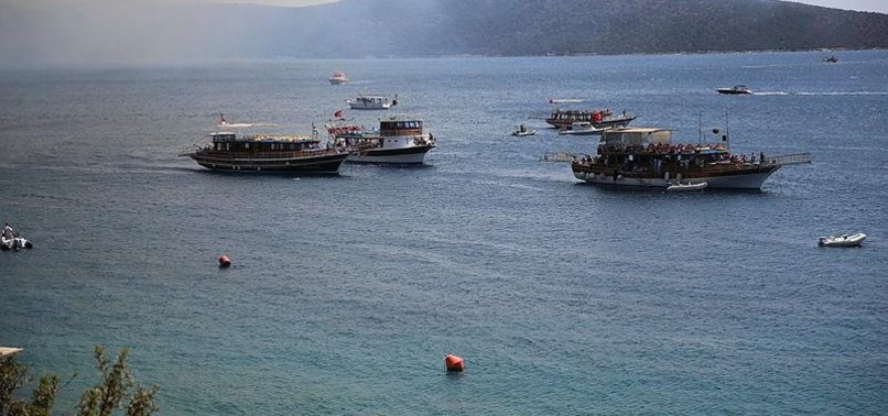 TURKEY EVACUATES PANICKED TOURISTS BY BOAT FROM WILDFIRES